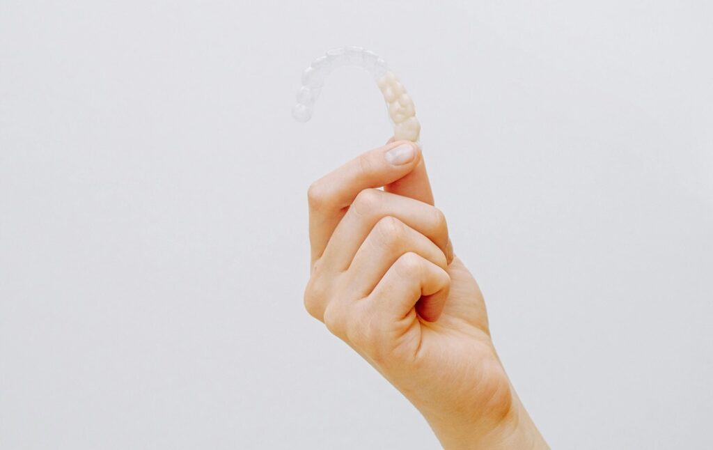Holding an invisalign
